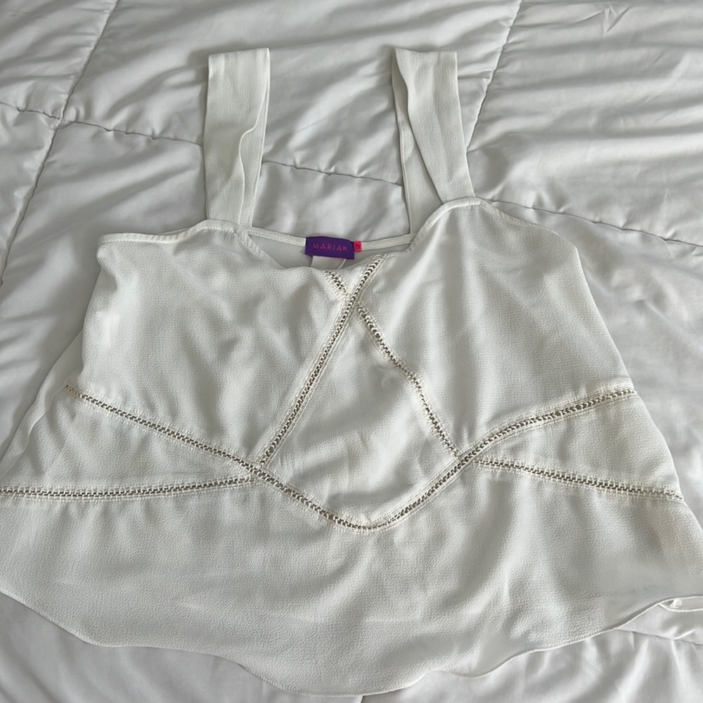 S/M white tank top. It was worn one time
